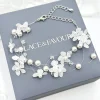 Beads & Beyond Pearl Jewellery | Silver Wedding Jewellery*Elfin Illusion Pearl and Crystal Flower Bracelet Ivory/ Silver