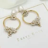 Freya Rose Pearl Jewellery | Gold Wedding Jewellery*Seed and Baroque Pearl Mid Hoop Earrings