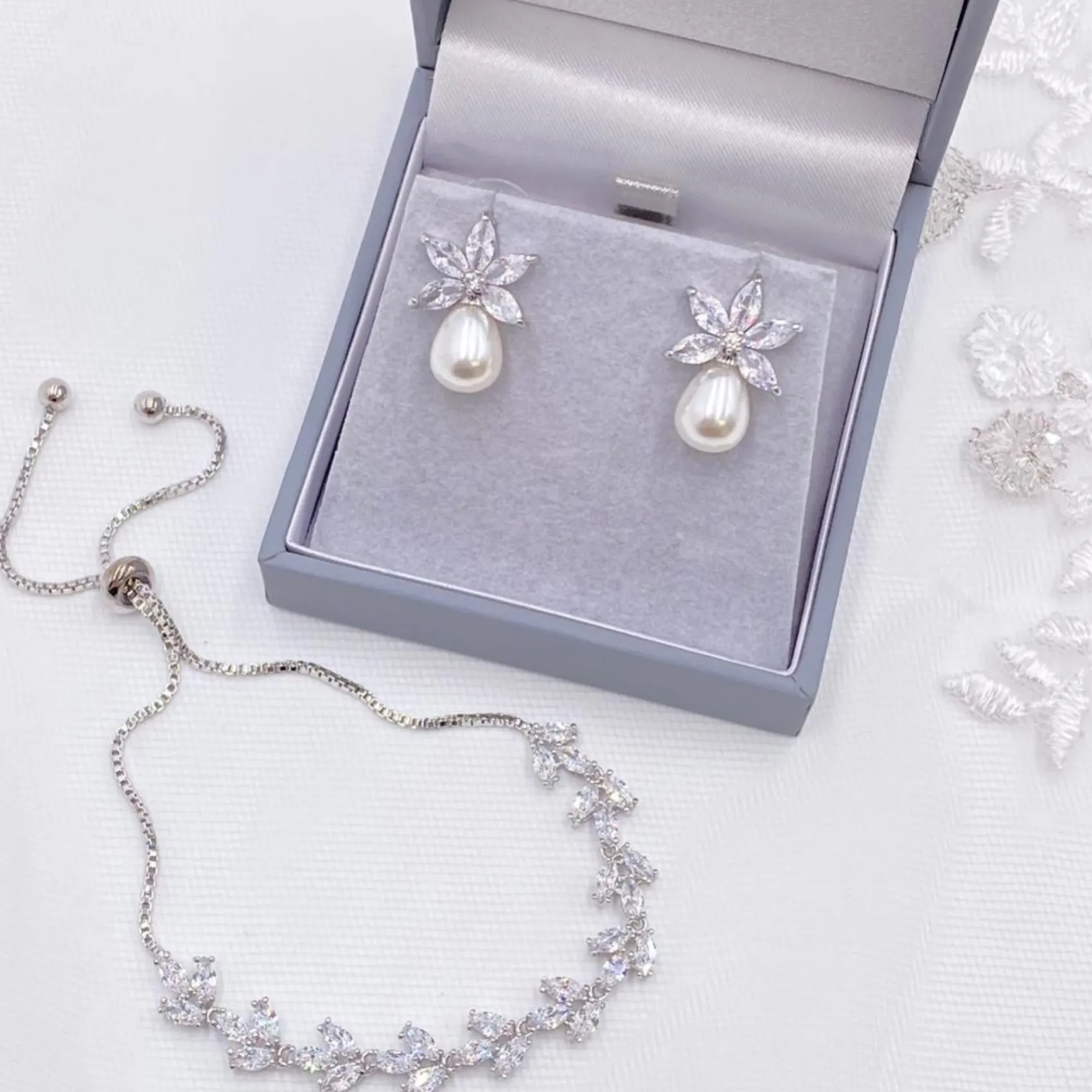 Lace & Favour Pearl Jewellery | Silver Wedding Jewellery*Sahara Silver Crystal Leaves and Teardrop Pearl Earrings Ivory/ Silver