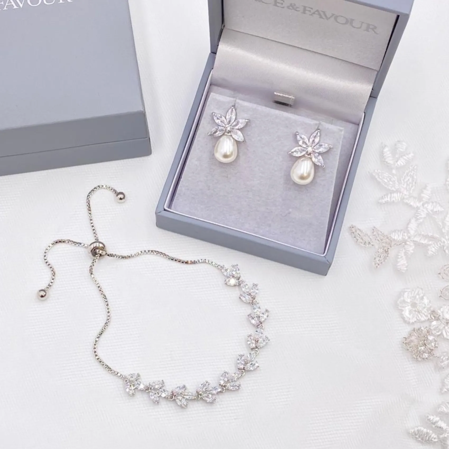 Lace & Favour Pearl Jewellery | Silver Wedding Jewellery*Sahara Silver Crystal Leaves and Teardrop Pearl Earrings Ivory/ Silver